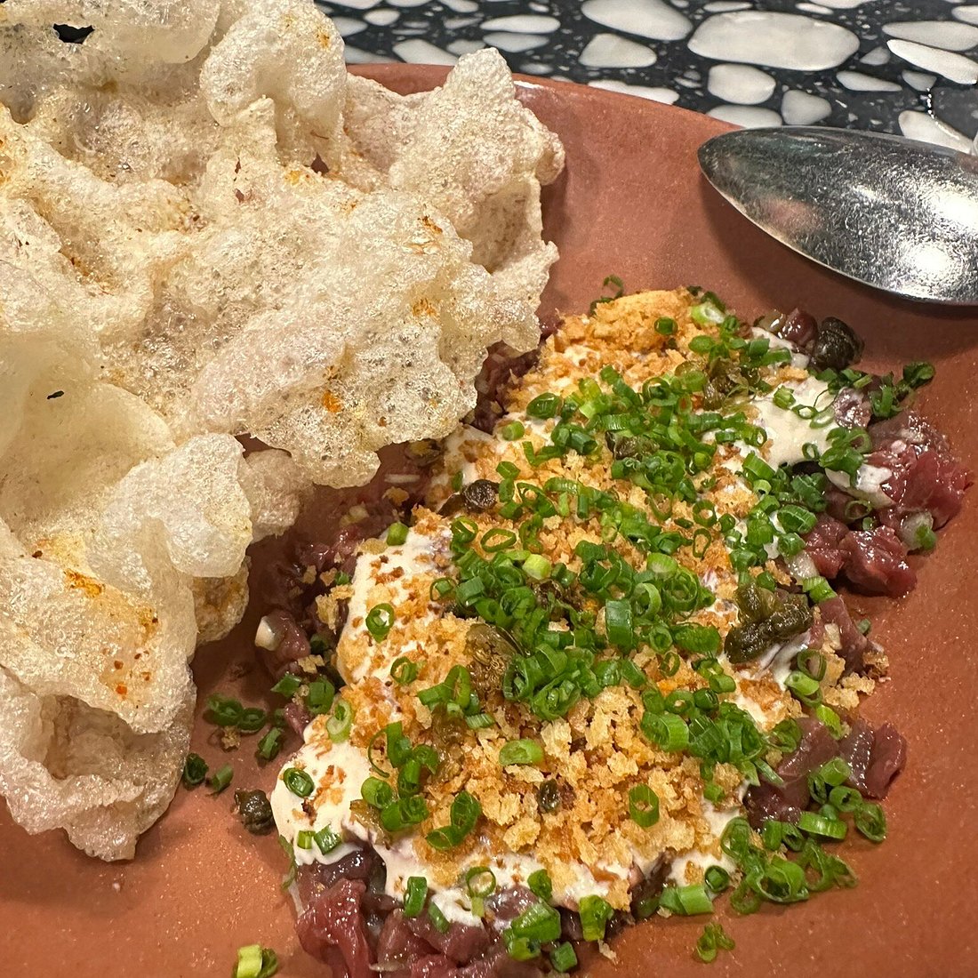 Boia De signature dishes Beef Tartare, Lamb Ribs Fra Diavola, Pappardelle Alla Lepre, Tagliolini Nero, and Bufala Ricotta Gnocchi Alla Norcina